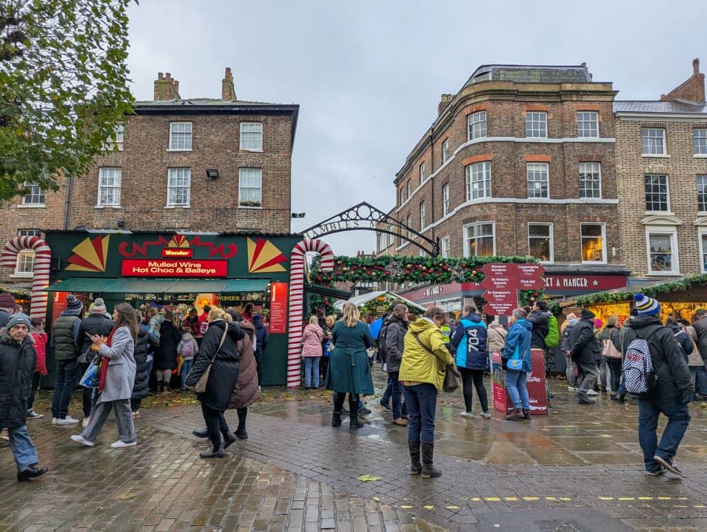 Christmas market in York - square with people and stalls.