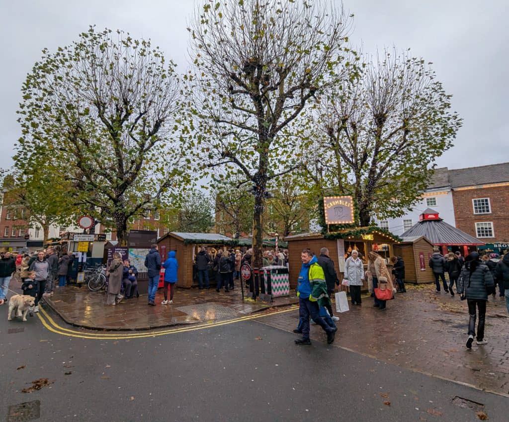 Christmas market in York - square with people and stalls.