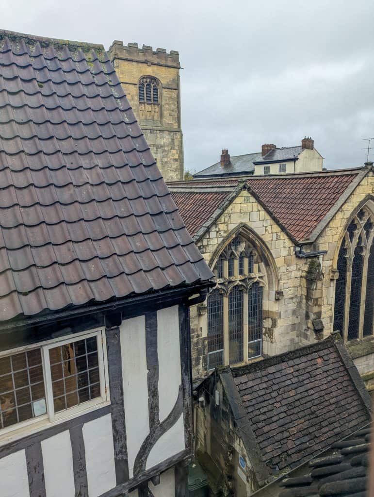 A view from the window in the Valhalla pub showing medieval buildings.