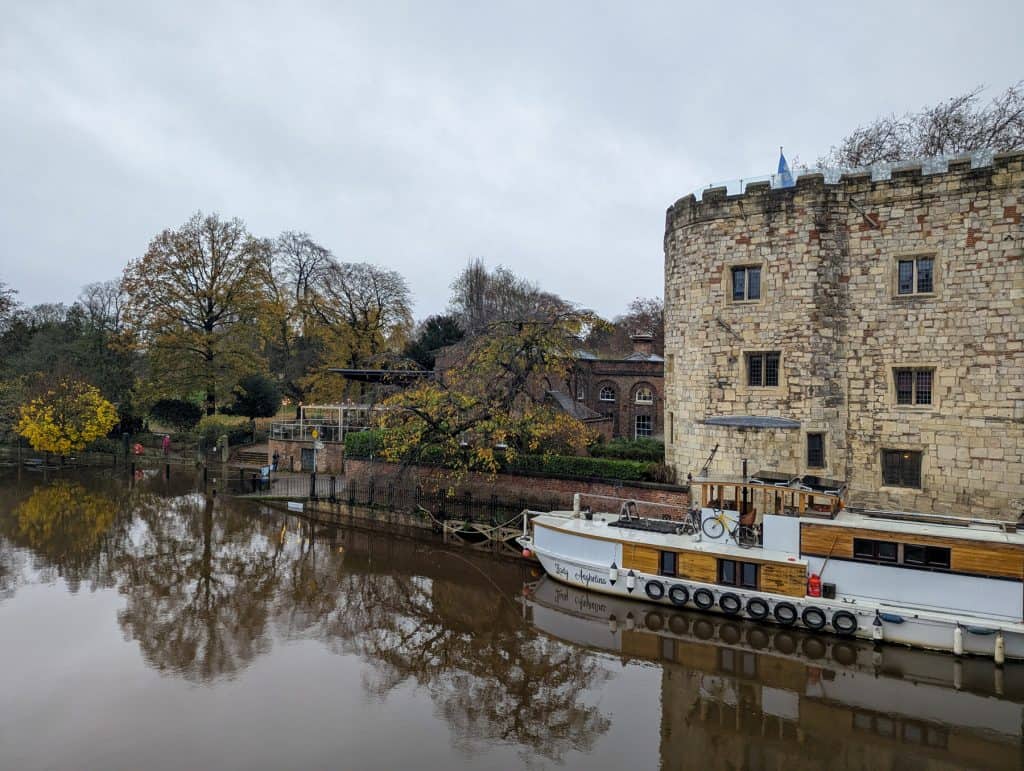View at the river and boat from a bridge in York.
