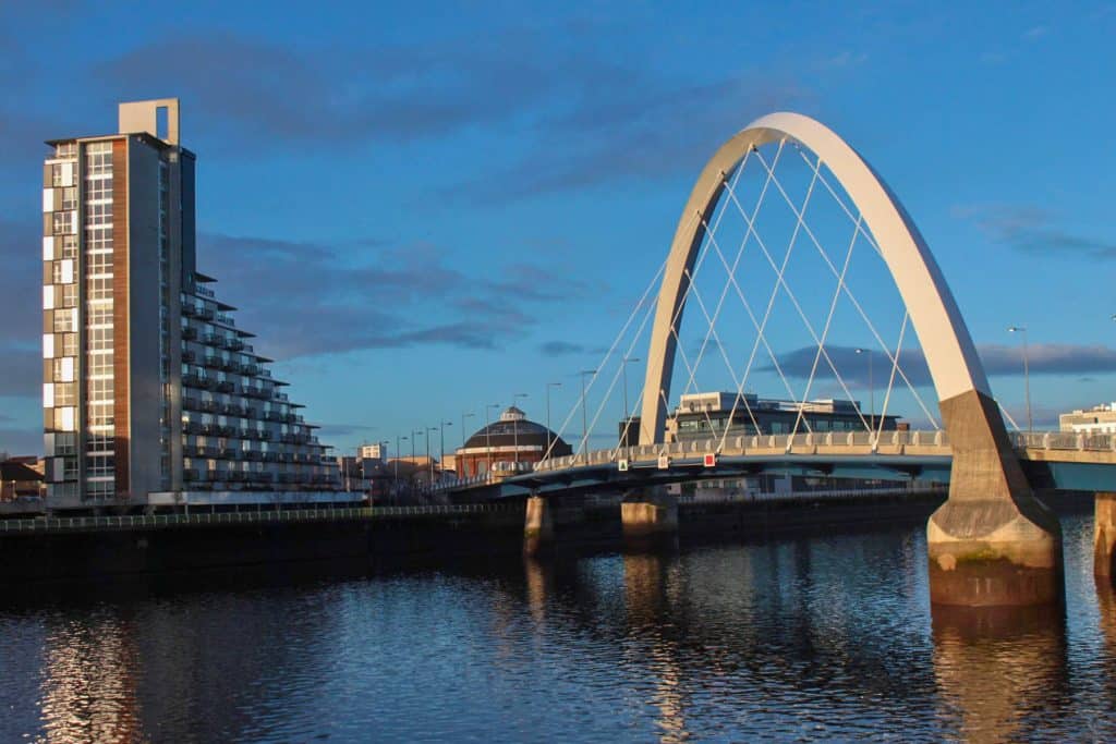Detail on the Clyde Arc bridge and buildings in Glasgow