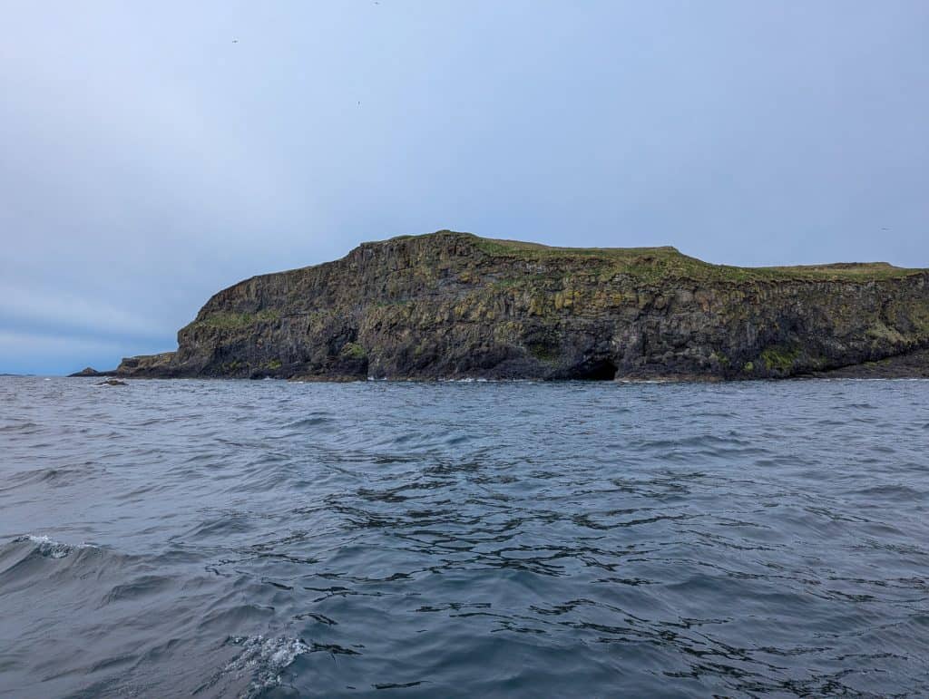 Staffa Island on Isle of Mull from a boat.